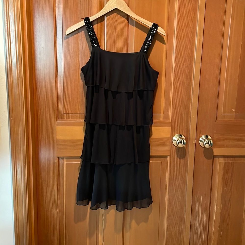 ENFOCUS Studio woman’s black ruffled dress with sparkly straps